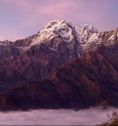 The mountains looks like floating in clouds captured during Mardi Himal Base Camp Trek